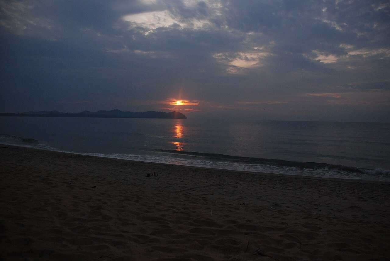 The wide sandy sweep of Cherating Beach on the South China Sea